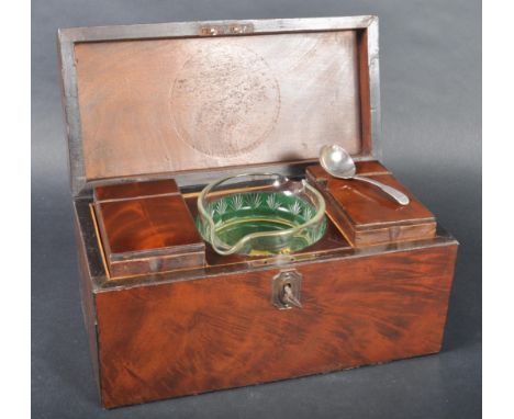 An early 19th Century Regency period flame mahogany tea caddy box. Square form with swing handle to lid that opens to reveal 