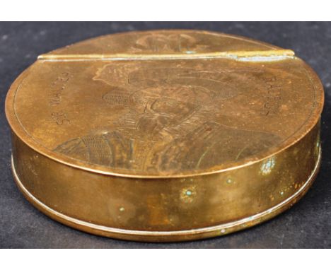 A 19th Century brass snuff box of round form with decoration and notation depicting Sir Walter Ralegh. The box with split sec