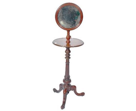A 19th Century William IV mahogany gentleman's bachelors shaving stand comprising of a circular reeded edge mirror panel over