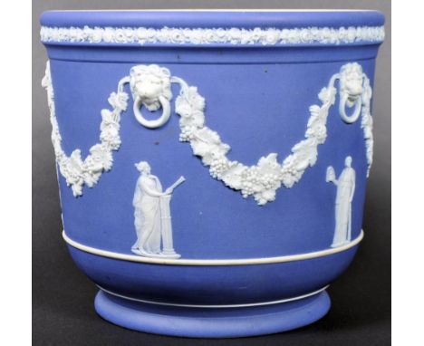 A 19th Century Wedgwood dip cobalt blue jasperware cameoware pottery / ceramic planter jardiniere vase. Hand decorated in cla