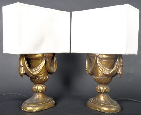 A matching pair of 20th Century 1930's Art Deco gilt resin table lamp lights each of urn shape form with square shaped shades