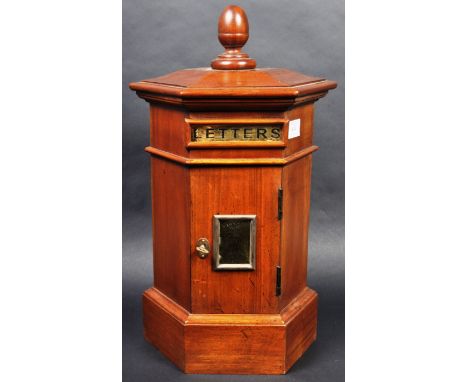 A 20th Century Edwardian manner Country House / Hotel table top letter box / post box of hexagonal form. Mahogany constructio