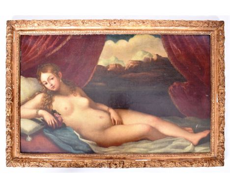 An 18th Century oil on canvas portrait painting depicting a reclining nude lady with views to the backdrop. Set with a 19th C