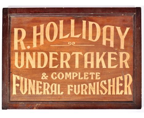 An Edwardian mahogany funeral directors sign reading " R. Holliday, Undertaker &amp; Complete Funeral Furnisher". No signs of