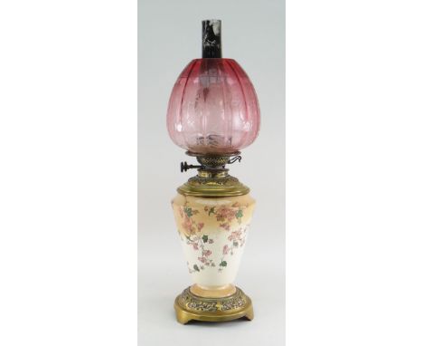 LATE VICTORIAN BRASS MOUNTED OIL LAMP with etched cranberry shadeThere are a few small chips to the top of the shade and a fe