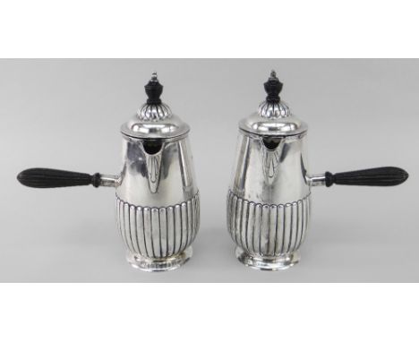 PAIR OF LATE VICTORIAN SILVER CHOCOLATE POTS, Sheffield 1887, by Howell &amp; James Limited, half fluted bodies, ebonized han