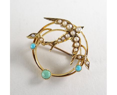 YELLOW GOLD SEED PEARL &amp; TURQUOISE SWALLOW BROOCH in a circular frame, un-hallmarked, 3.8gms