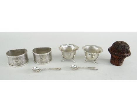 ASSORTED SILVER &amp; COLLECTABLES to include two salts and spoons, pair of napkin rings and a carved coquilla nut (7)