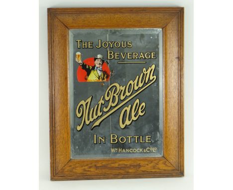 EARLY 20TH CENTURY OAK FRAMED PUB MIRROR advertising William Hancock & Co Ltd, 'Nut Brown Ale in Bottle - The Joyous Beverage