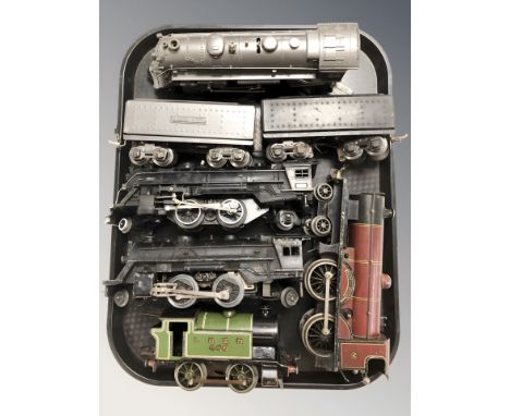 Three Lionel die cast metal locomotives, two further similar tenders and two other 20th century tin plate locomotives.