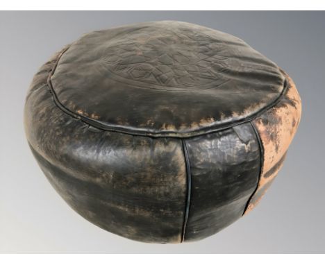 A vintage leather pouffe, width 55 cm 