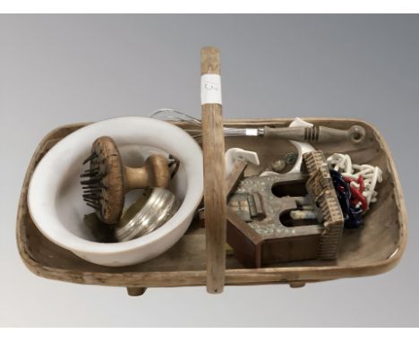 A Sussex trug basket and contents including folk art weather house, whisk, Goss beer bowls, etc. 