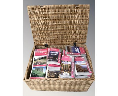 A wicker hamper containing a large quantity of Ordnance Survey maps 