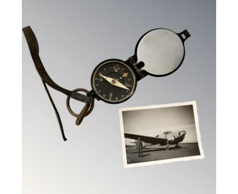 A German Busch compass, circa 1930's, together with a monochrome photo of a German pilot and aircraft