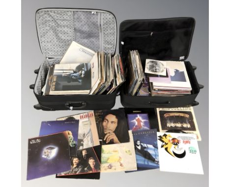 Two luggage cases containing vinyl LP records, mixed artists, Madonna, Bob Marley, compilations and soundtracks, etc.