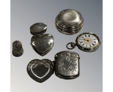 A silver vesta, fob watch, pill box with gilded interior, two further boxes, heart shaped book mark and thimble  CONDITION RE