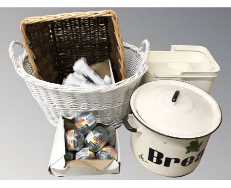 Two wicker baskets, an enameled housekeepers box, a further bread bin, several spools of twine.