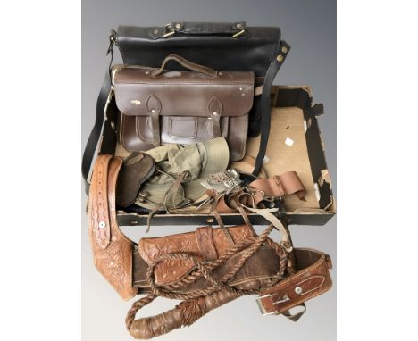 A leather holster, whip, belts, bags, etc. (1 box)