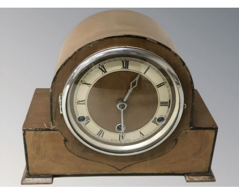 An Art Deco walnut eight day mantel clock, height 22 cm (with pendulum and key)