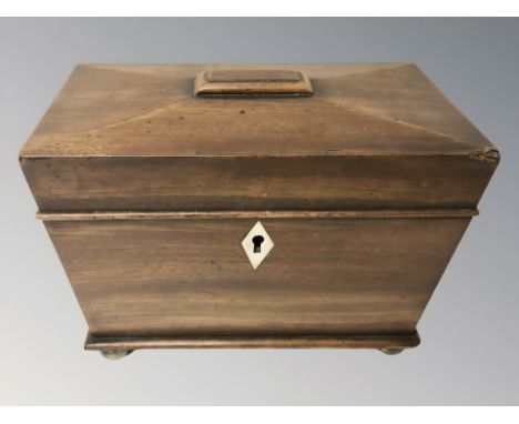 A 19th century mahogany sarcophagus tea caddy, width 21 cm.
