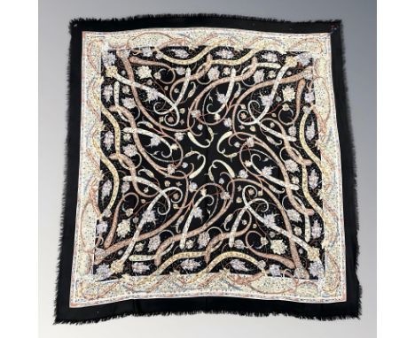 A Liberty & Co silk scarf or shawl, 130cm², and a further Liberty Cashmere example, 135cm². (2) CONDITION REPORT: Cashmere pi