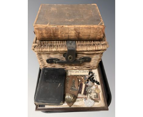 Two antique bibles, a small wicker hamper, religious panel, rosary beads and similar items. 