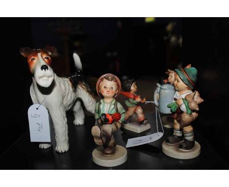 GROUP OF GOEBEL FIGURES OF BOYS AND A BESWICK STYLE DOG 