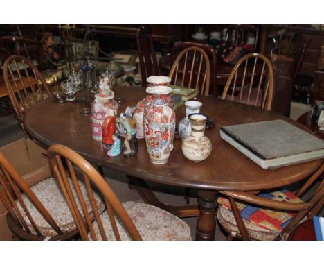 ERCOL LIGHT OAK DINING TABLE AND SIX CHAIRS