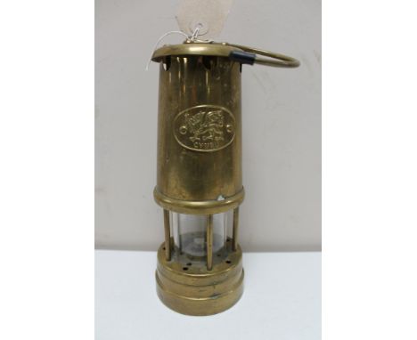 A brass Welsh miner's lamp 