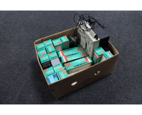 A box of Kindermann projector together with a large quantity of slide boxes 