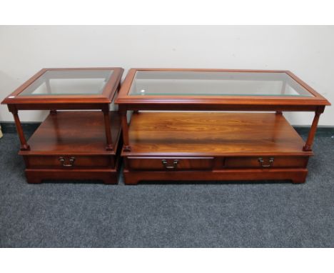 A mahogany glass top coffee table and matching lamp table 