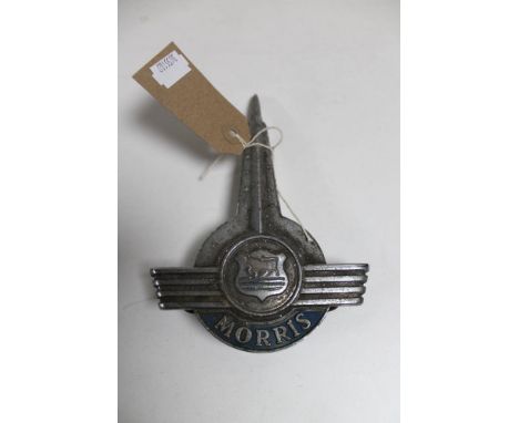 A vintage Morris truck badge
