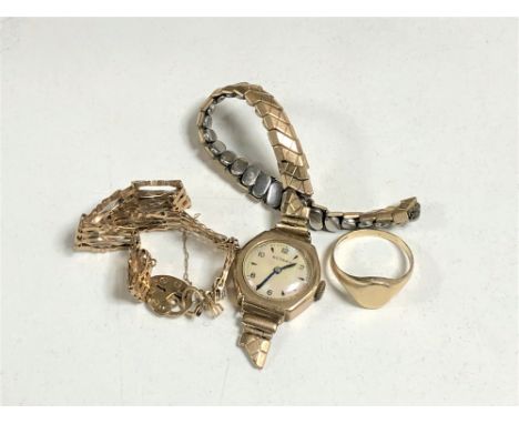 A 9ct gold gate bracelet (4.3g), together with a 9ct gold signet ring (2.2g) and a 9ct gold backed lady's wristwatch. (3)