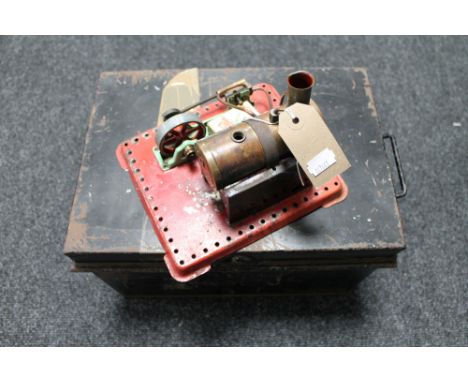 A hand built steam engine together with a tin trunk containing a large quantity of Meccano magazines 