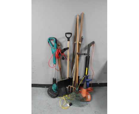 A plastic tub containing gardening tools, two electric strimmers, hedge trimmer and disability walking aid 