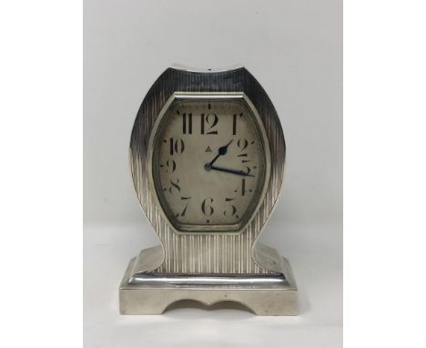 A good quality Art Deco silver cased 8 day mantel clock, Birmingham 1919