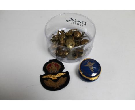 A box of militaria badges, buttons, sew on patch, Royal Air force pill box etc 