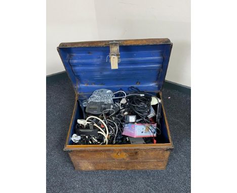 A tin trunk of electricals and cabling 
