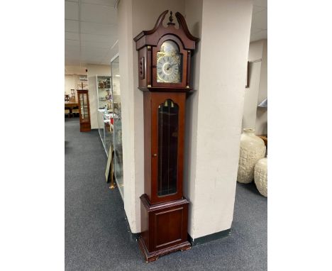 A contemporary Tempus Fugit longcase clock 