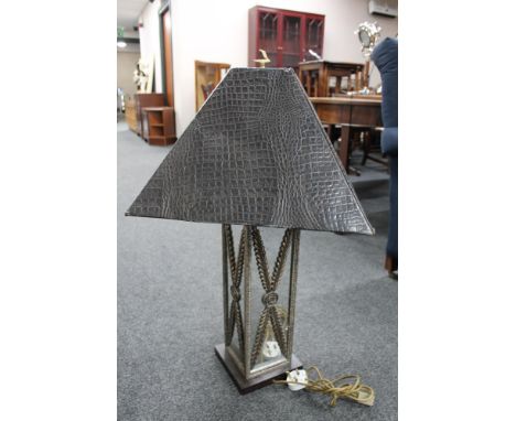 A contemporary mirrored table lamp with leather look shade 