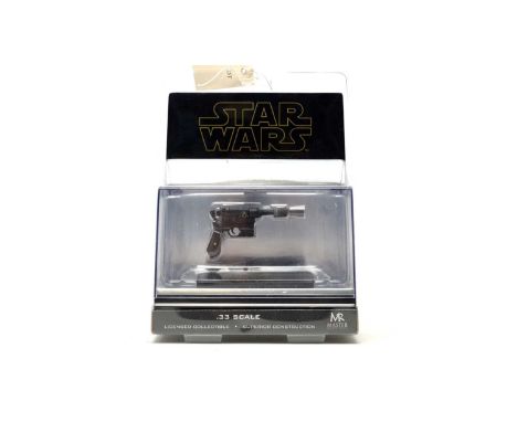 A Master Replica Star Wars The Empire Strikes Back Han Solo Blaster, scale .33 replica on original packaging. 