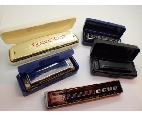 Hohner Blues harp Golden Melody harmonica Pro Harp Silver Star and an Echo harmonica 