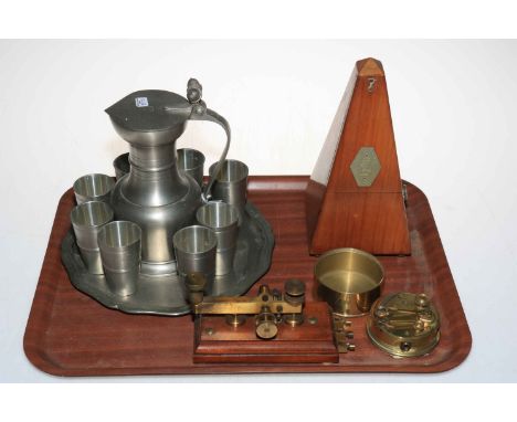 Baehler pewter jug, eight beakers and tray, metronome, and brass sextant.