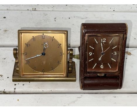 Jaeger 2 brass cased alarm clock and a Jaeger Le Coultre 8 travelling alarm clock retailed by Eberhard, Milan.