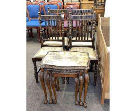 Set of four oak bobbin leg dining chairs and nest of three walnut tables on ball and claw legs.