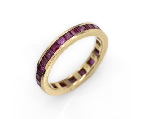18 kt Gold Rubin-Memoryring,   GG 750/000, 29Rubincarrees zus. ca. 0.80 ct, RW 53, ca. 3.5 g Schätzpreis: 850, - EUR18 kt gol