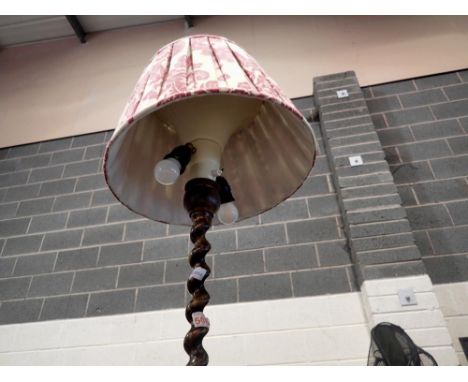 Turned wooden twin bulb standard lamp with shade, H: 180 cm. All electrical items in this lot have been PAT tested for safety