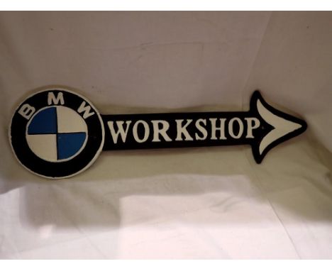 BMW cast iron workshop arrow sign, L: 40 cm. P&amp;P Group 1 (£14+VAT for the first lot and £1+VAT for subsequent lots) 