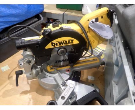 DeWalt electric Cross Cut Mitre Saw with manual, 240v. All electrical items in this lot have been PAT tested for safety and h