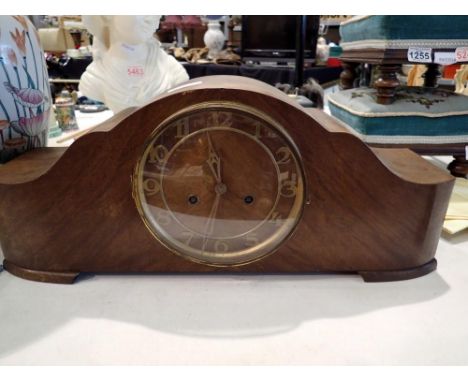 Large early 20th century walnut cased mantel clock, three bar chime, working at lotting but requires pendulum. Not available 